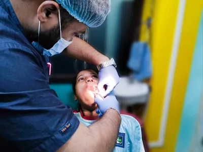 Painless extraction of hopeless impacted tooth under local anesthesia at Dentity Dental Sonarpur in Sonarpur, Kolkata