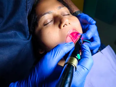 Use of low laser therapy to treat peri-implantitis at Dentity Dental Teghoria